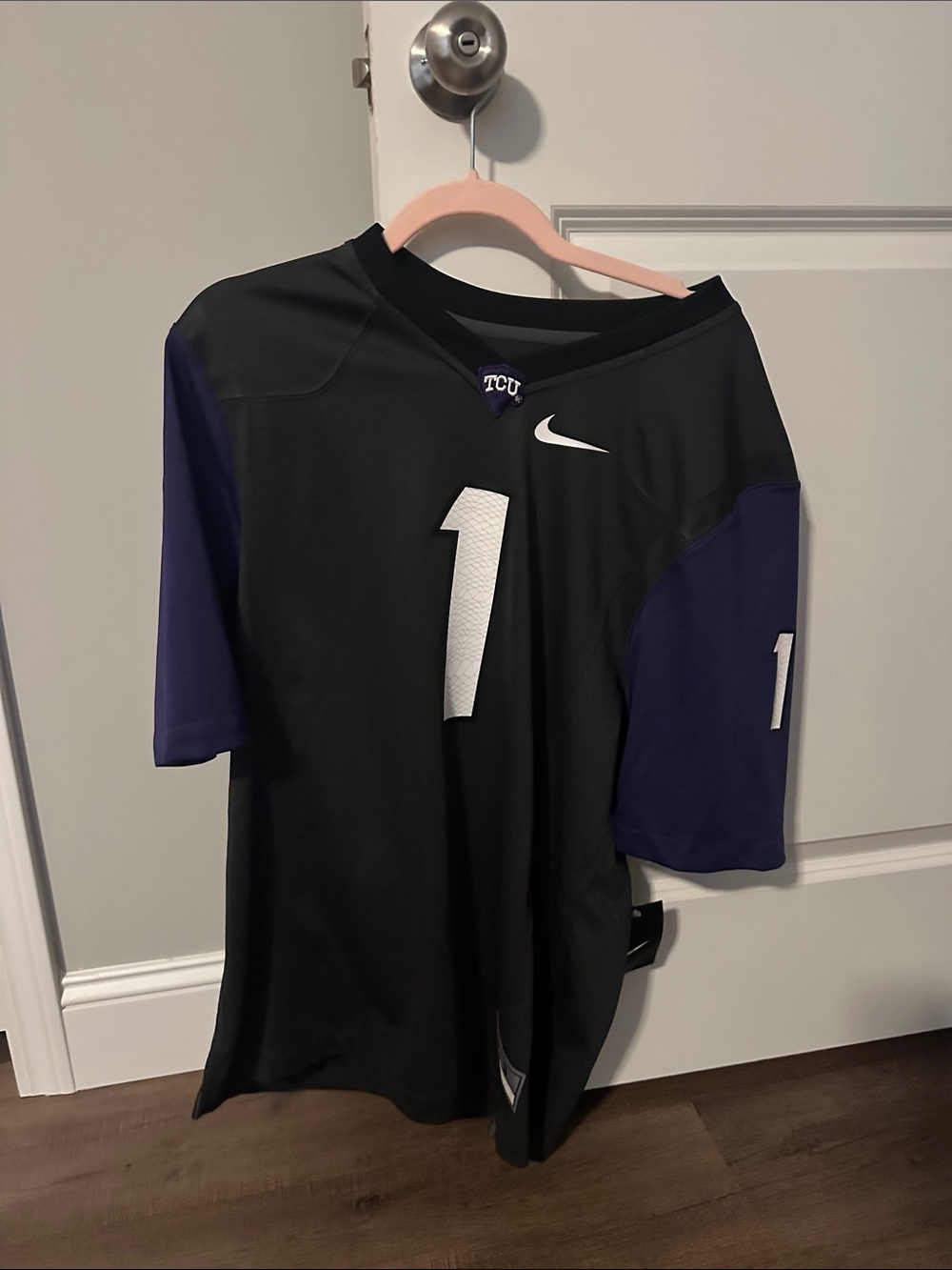 Nike Black Football Jersey with Purple Sleeves